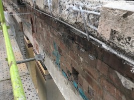 Concrete and structural repair Site investigation found that a structural beam had developed concrete cancer and exposed rebar. Through the removal of loose concrete and further grinding, the areas were prepared, cleaned and treated the steel with corrosion protective primers and patched with a...